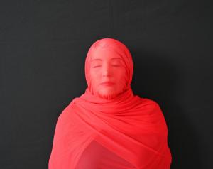 A woman with a red veil | NICRC