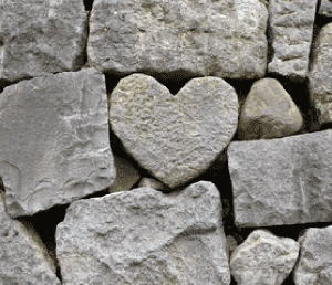 Natural stone carved into the shape of a heart | NICRC