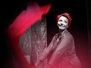 A woman on stage smiling | CRC NI