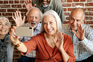 Elderly people taking a selfie | NICRC