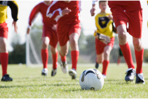 Boys playing football | NICRC