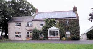 Glebe House covered in ivy | CRC NI