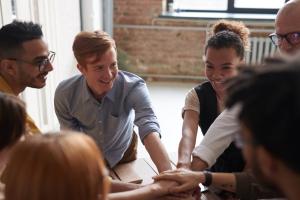 People together around a table | NI CRC