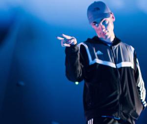 A teenager in a tracksuit on stage | CRC NI