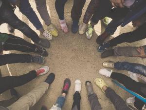 People standing in a circle | NI CRC