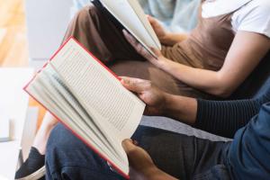 Man and woman reading together | CRC NI