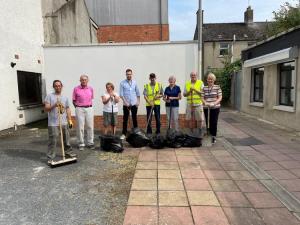 People helping to clean the streets | NICRC