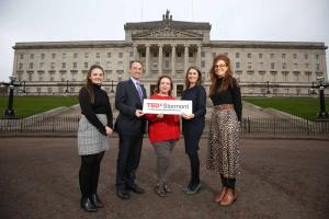 Five people outside Stormont at the TedX launch | CRC NI