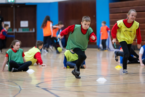 A boy running sporting drills | NICRC