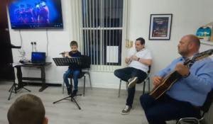 Jonathan playing with two other musicians | CRC NI