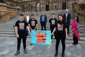 (back row, left to right) Rory Campbell, Michael McDonnell, Martin McDonald MBE and Nisha Tandon, alongside local young people (front row, left to right) Aaron Smith, Ahmed Fawzy, Aron Hughes and Esraa Hamido | NICRC